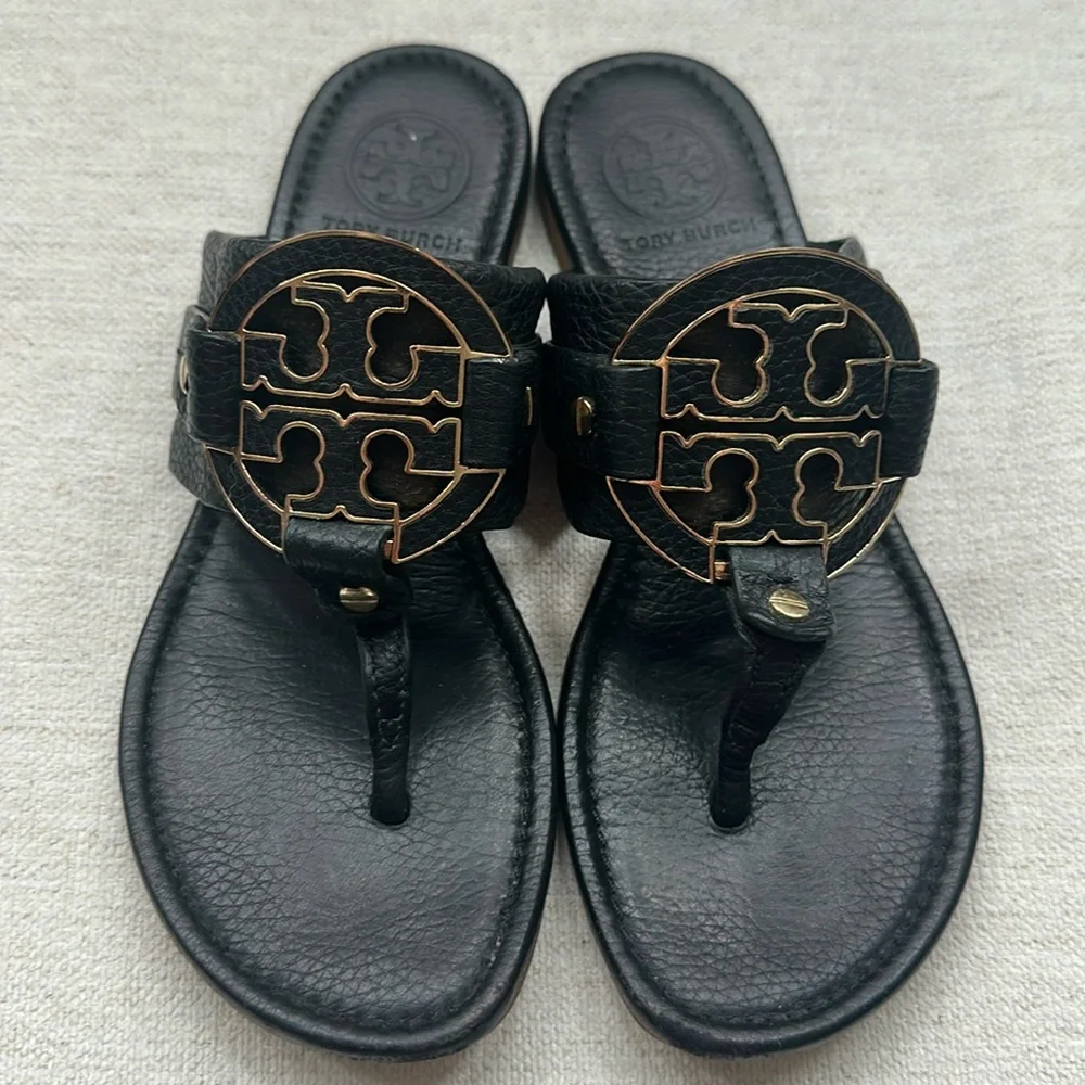 Tory Burch Black Leather Logo  with Gold Accents. Excellent condition with box.